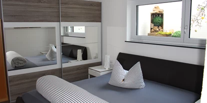 Monteurwohnung - Zimmertyp: Doppelzimmer - Bad Urach - Schlafzimmer - Ferienwohnung Am Weissgerber