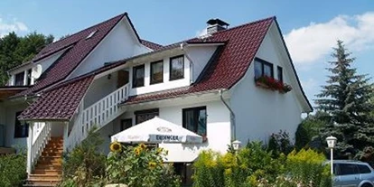 Monteurwohnung - Zimmertyp: Einzelzimmer - Wülperode - Hausansicht Gartenseite - Gästehaus Bruns im Harz