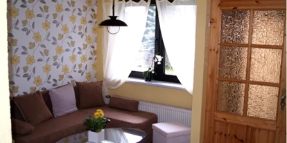 Monteurwohnung - Einzelbetten - Berßel - Wohnzimmer FeWo I - Gästehaus Bruns im Harz