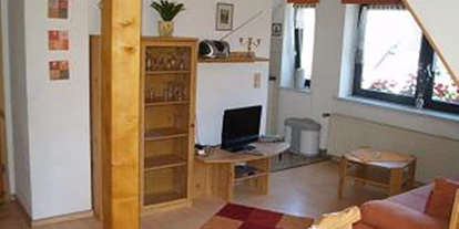 Monteurwohnung - TV - Berßel - Wohnzimmer FeWo II - Gästehaus Bruns im Harz