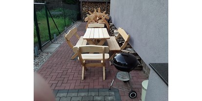 Monteurwohnung - Sitzecke mit Grill - Kai Jungerberg