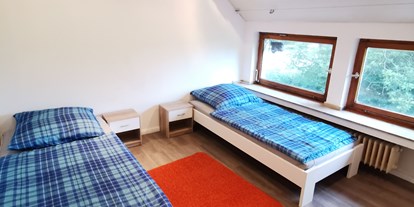 Monteurwohnung - Düsseldorf - Zimmer 2 mit Einzelbetten in der Monteurwohnung in Düsseldorf. - DISCOUNT-APARTMENTS---Düsseldorf---Köln-Leverkusen-Wuppertal-Bergheim-Neuss