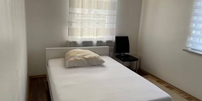 Monteurwohnung - Einzelbetten - PLZ 65428 (Deutschland) - Schlafzimmer  - City Appartement 