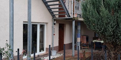 Monteurwohnung - Neuerburg - Appartment von außen. Terrassennutzung selbstverständlich möglich. - Fam. Thiex