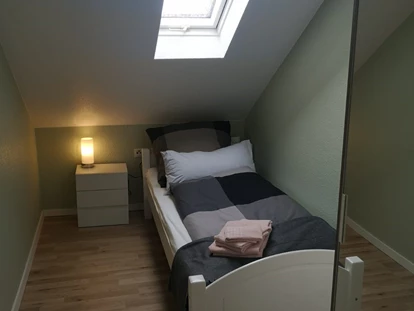 Monteurwohnung - TV - Deutschland - Einzelzimmer im Monteurzimmer Spessart-T-Raum in Triefenstein. - Spessart-T-Raum - Monteurzimmer