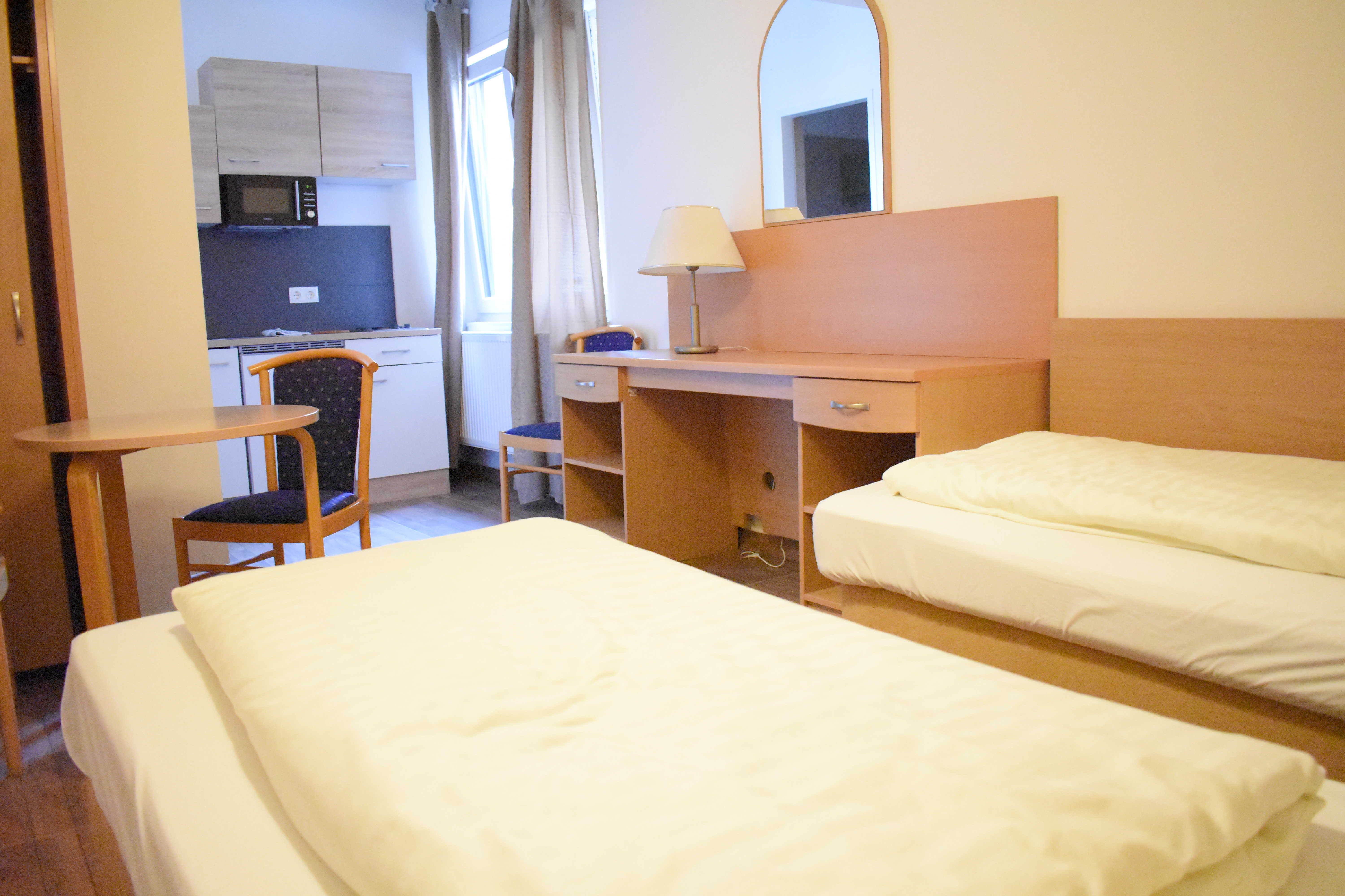 Monteurzimmer: Triangle Management GmbH