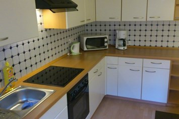 Monteurzimmer: Küche zur Selbstversorgung - Moderne Monteurunterkunft mit Highspeed Internet
