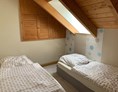Monteurzimmer: Schlafzimmer mit Einzelbetten - Monteur Wohnung 2 Schlafplätze 