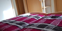 Monteurwohnung - Zimmertyp: Doppelzimmer - Deensen - Schlafzimmer in der Monteurunterkunft in Delligsen. - Monteurzimmer Delligsen