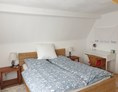 Monteurzimmer: Bett 160x200cm - Unser Obervolkacher Ferienhaus - die Ferienwohnung