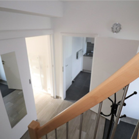 Monteurzimmer: Treppenhaus ins 1.OG - DONAU HOME - Münsingen