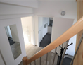 Monteurzimmer: Treppenhaus ins 1.OG - DONAU HOME - Münsingen