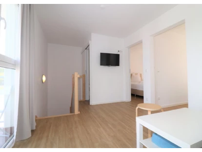Monteurwohnung - PLZ 72531 (Deutschland) - Wohnbereich im 1.OG mit Zugang zu 2 weiteren Schlafzimmern - DONAU HOME - Münsingen