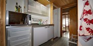 Monteurwohnung - Schweiz - Küche - rustikales Zimmer