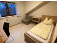 Monteurzimmer: Ferienwohnung Winter Einbettzimmer und Sofa - Privatzimmer & Ferienwohnungen Leeb