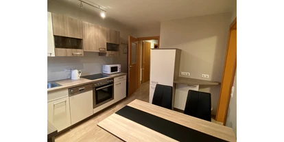 Monteurwohnung - Parkplatz: eigener Parkplatz vorhanden - Österreich - Ferienwohnung Winter Küche - Privatzimmer & Ferienwohnungen Leeb