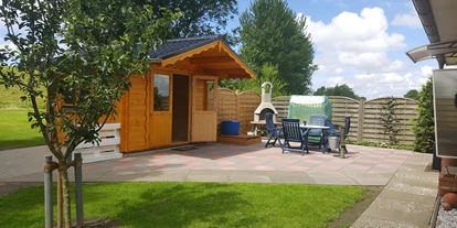 Monteurwohnung - Hund erlaubt - Schleswig-Holstein - Holzhaus mit Terrasse - "Haus Inge"