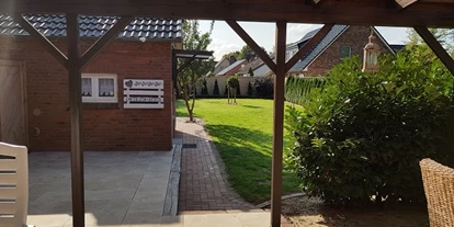 Monteurwohnung - Hund erlaubt - Schleswig-Holstein - Überdachte Terrasse - "Haus Steffi"