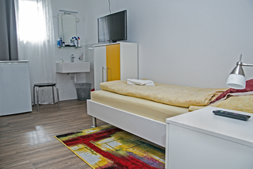 Monteurzimmer: Einzelzimmer mit Du/Wc im Zimmer - SleepBox
