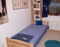 Monteurzimmer: Bett 1 in Zimmer 1. - Zimmer-für-Monteure