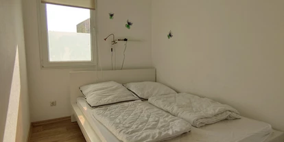 Monteurwohnung - Bettwäsche: Bettwäsche gegen Gebühr - Deutschland - Schlafzimmer - Oase am See Heimat Bungalows