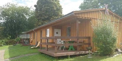 Monteurwohnung - Bettwäsche: Bettwäsche gegen Gebühr - Deutschland - Terrasse - Oase am See Heimat Bungalows