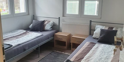 Monteurwohnung - Darmstadt - Schlafzimmer 1 - J&P Brunetti Zimmervermietung Rüsselsheim