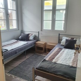 Monteurzimmer: Schlafzimmer 1 - J&P Brunetti Zimmervermietung Rüsselsheim