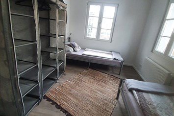 Monteurzimmer: Schlafzimmer 2 - J&P Brunetti Zimmervermietung Rüsselsheim