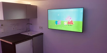 Monteurwohnung - PLZ 35781 (Deutschland) - Küche und 43” 4K TV - Sweet Lounge