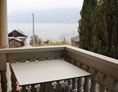 Monteurzimmer: Balkon mit seitlichem Seeblick - Gasthof Gruber Zimmer 1