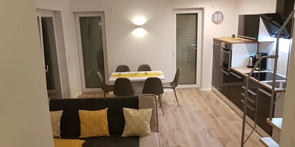 Monteurwohnung - Bettwäsche: Bettwäsche gegen Gebühr - Deutschland - Wohn-Essbereich - Ferienhaus am See Goch-Kessel