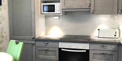 Monteurwohnung - Kaffeemaschine - Schleswig-Holstein - Küche:
zu sehen : Kühlschrank, Gefrierschrank, Microwelle, Herd, Backofen, Toaster - "Villa Düne" für Handwerker und Reisende