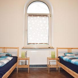 Monteurzimmer: Alle Betten sind mit neuwertigen Matratzen ausgestattet, die guten Liegekomfort und erholsamen Schlaf versprechen. - domum group Duisburg