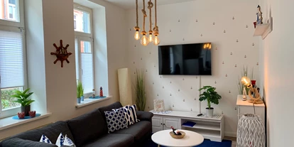 Monteurwohnung - Bettwäsche: Bettwäsche gegen Gebühr - Deutschland - Wohnzimmer - NAUTICA Apartment Rostock Innenstadt Balkon bis 6 Personen EG