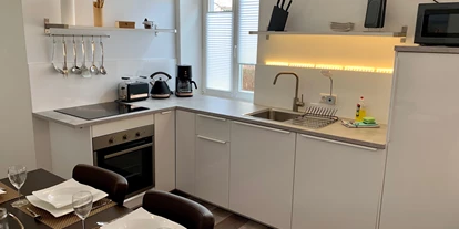 Monteurwohnung - Bettwäsche: Bettwäsche gegen Gebühr - Deutschland - Küche - NAUTICA Apartment Rostock Innenstadt Balkon bis 6 Personen EG