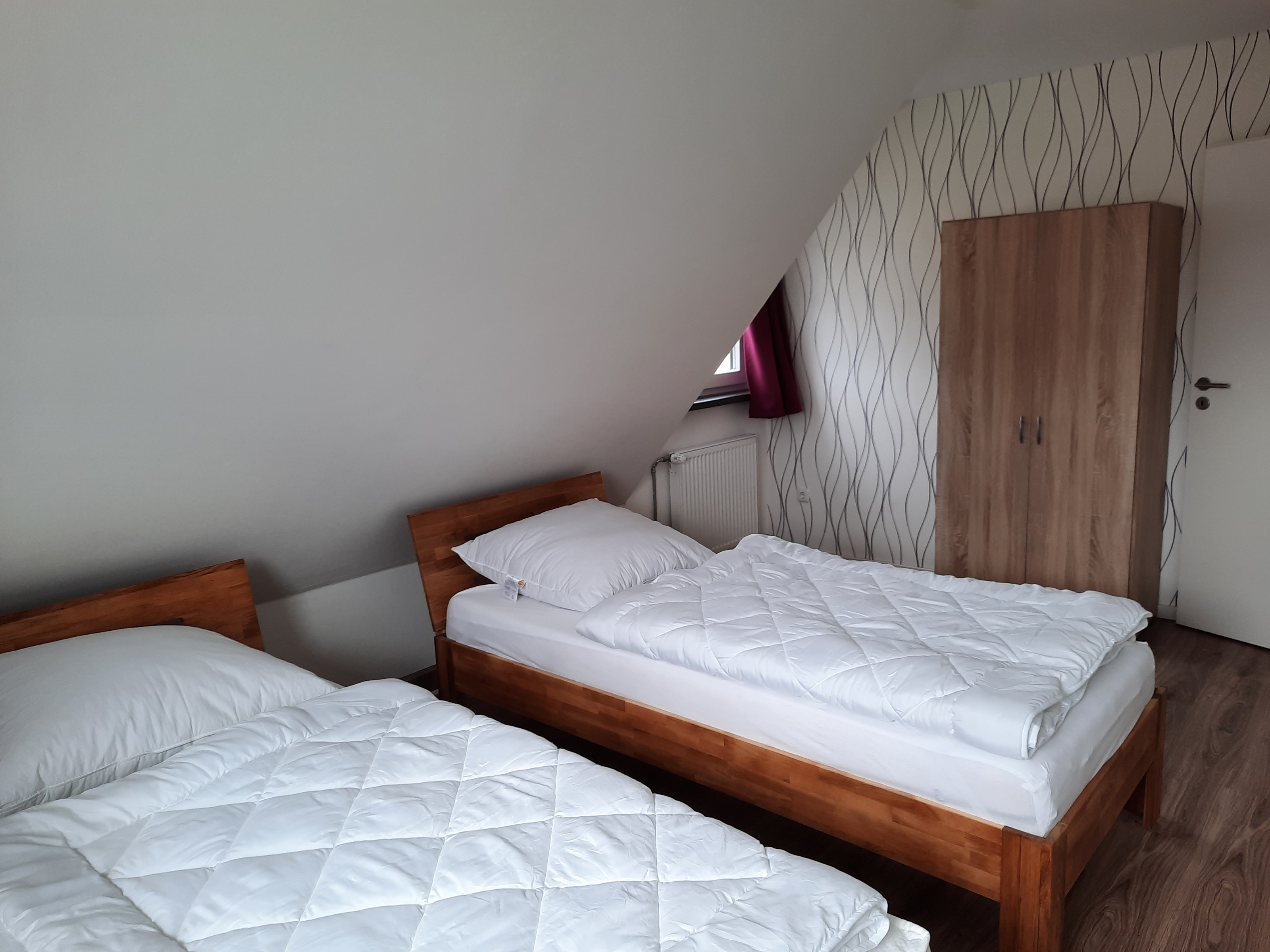 Monteurwohnung - Parkplatz: eigener Parkplatz vorhanden - Weserbergland, Harz ... - Schlafzimmer 1 - Ferienwohnung Persuhn