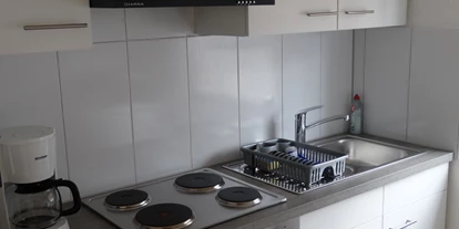 Monteurwohnung - Kaffeemaschine - Schleswig-Holstein - Voll ausgestattete Küche - Haus Holo - Ganzes Haus - bis 5 Monteure