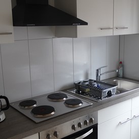 Monteurzimmer: Voll ausgestattete Küche - Haus Holo - Ganzes Haus - bis 5 Monteure
