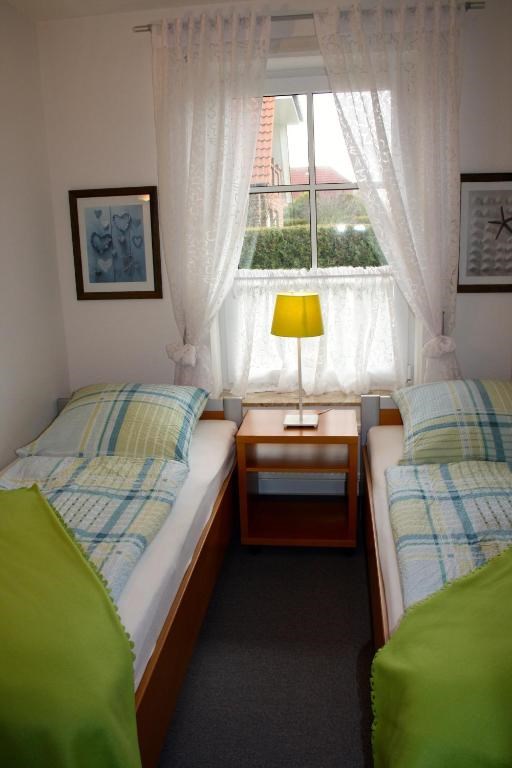 Monteurzimmer: Schlafzimmer mit zwei Einzelbetten in Wohnung 3 - Ferienwohnungen Südhoff