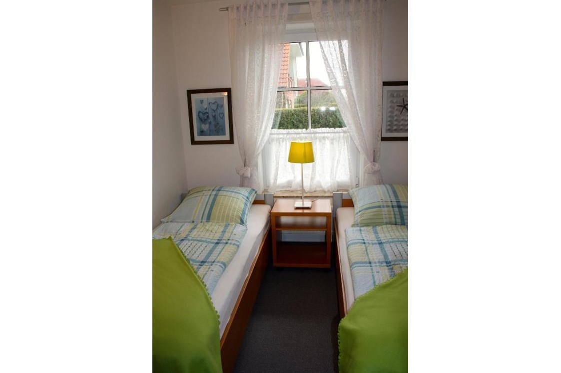 Monteurzimmer: Schlafzimmer mit zwei Einzelbetten in Wohnung 3 - Ferienwohnungen Südhoff