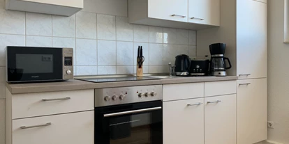Monteurwohnung - PLZ 04109 (Deutschland) - Voll ausgestattete Küche StayHere24 - Monteurzimmer Schkeuditz und Leipzig