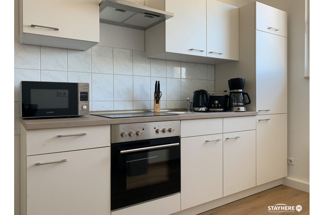 Monteurzimmer: Voll ausgestattete Küche StayHere24 - Monteurzimmer Schkeuditz und Leipzig