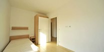 Monteurwohnung - Österreich - Schlafzimmer von Monteurzimmer Villach - 90+ Monteurzimmer in Villach, Einzelbetten, Parkplätze, WIFI, Küchen