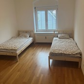 Monteurwohnung: Zimmer mit Einzelbetten in der Monteurwohnung in Dobl-Zwaring. - Azra Sinanovic