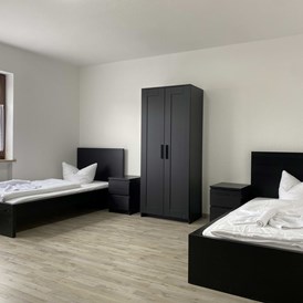 Monteurzimmer: Schlafzimmer - Komfortable Monteurwohnung (SAD201)