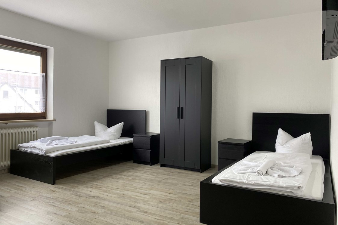 Monteurzimmer: Schlafzimmer - Komfortable Monteurwohnung (SAD201)