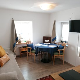 Monteurzimmer: Ess- und Wohnbereich Fewo - Ferienwohnung Saunahaus