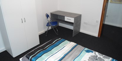 Monteurwohnung - Art der Unterkunft: Gästezimmer - Zimmer 1 mit Loggia in der Monteurunterkunft in Wolfsburg. - BSK-Monteurunterkünfte