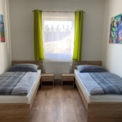 Monteurwohnung: Doppelzimmer mit Einzelbetten im Monteurzimmer in Neulengbach - Monteurzimmer-buchen.at  in Neulengbach
